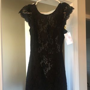Black lace, open back cocktail dress